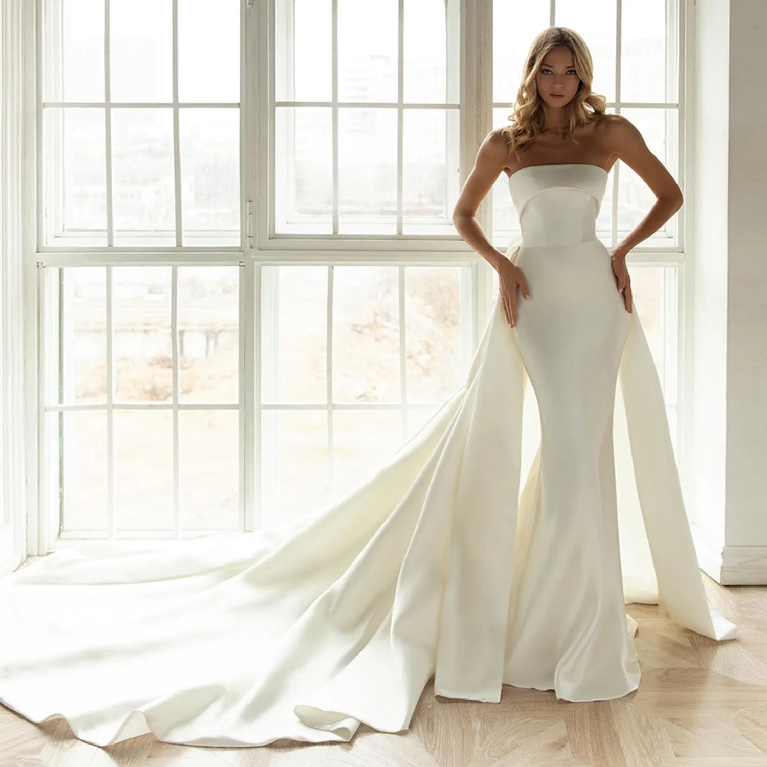 Elegant Satin Mermaid Wedding Dress with Detachable Train and Bow Back for a Modern Bridal Look