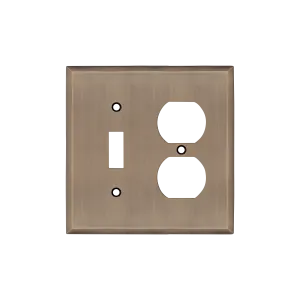 New York Switch Plate with Toggle and Outlet in Antique Brass