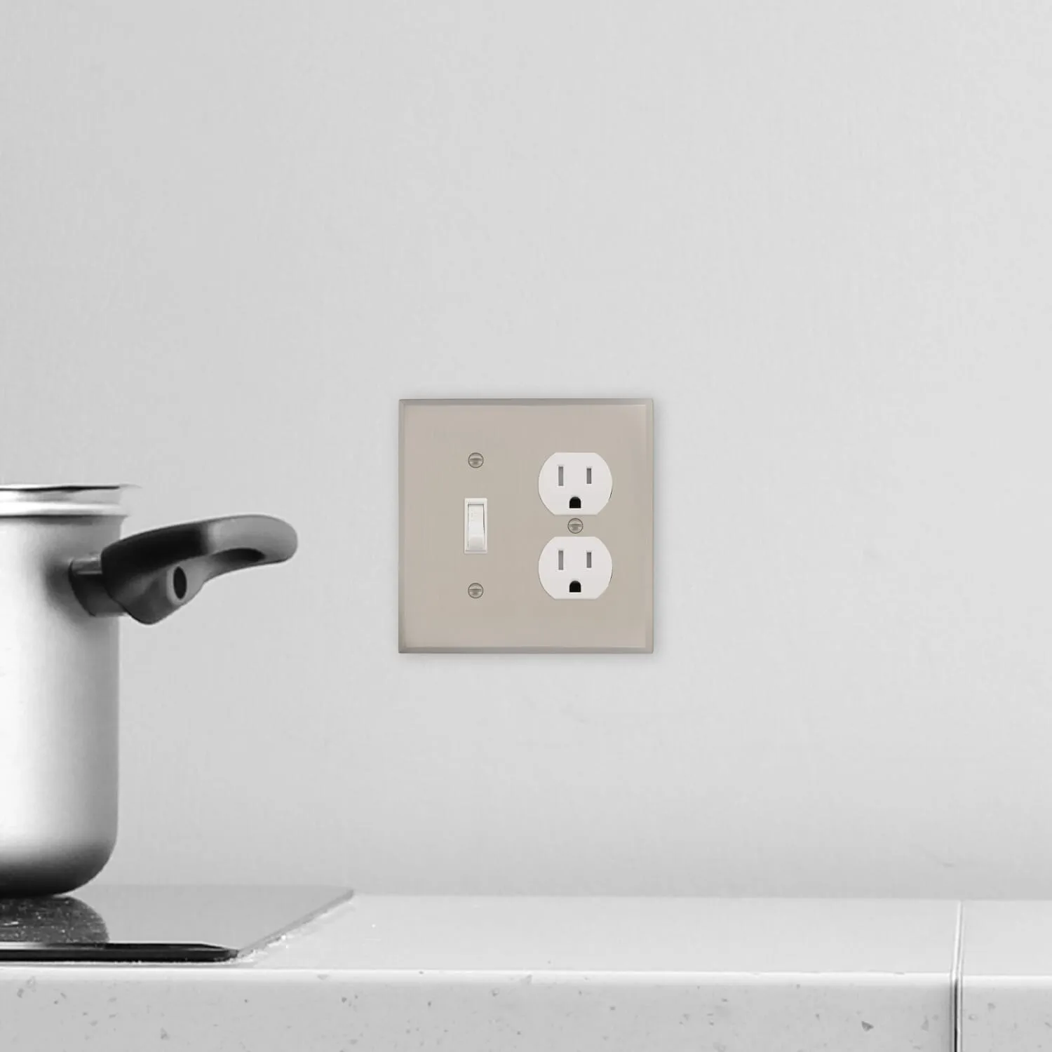 New York Switch Plate with Toggle and Outlet in Satin Nickel