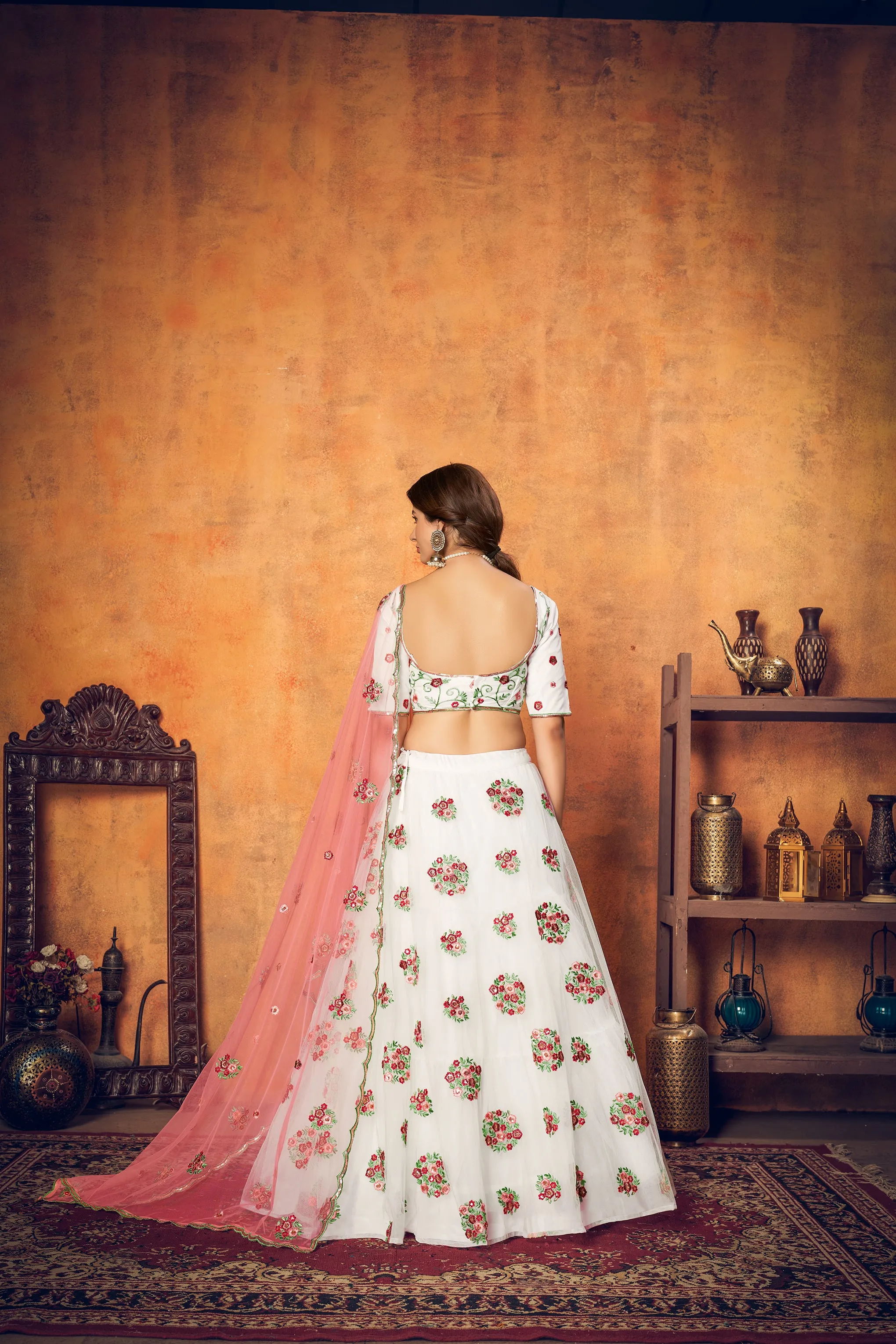 White Festive Wear Thread With Floral Sequence Embroidered Net Lehenga Choli