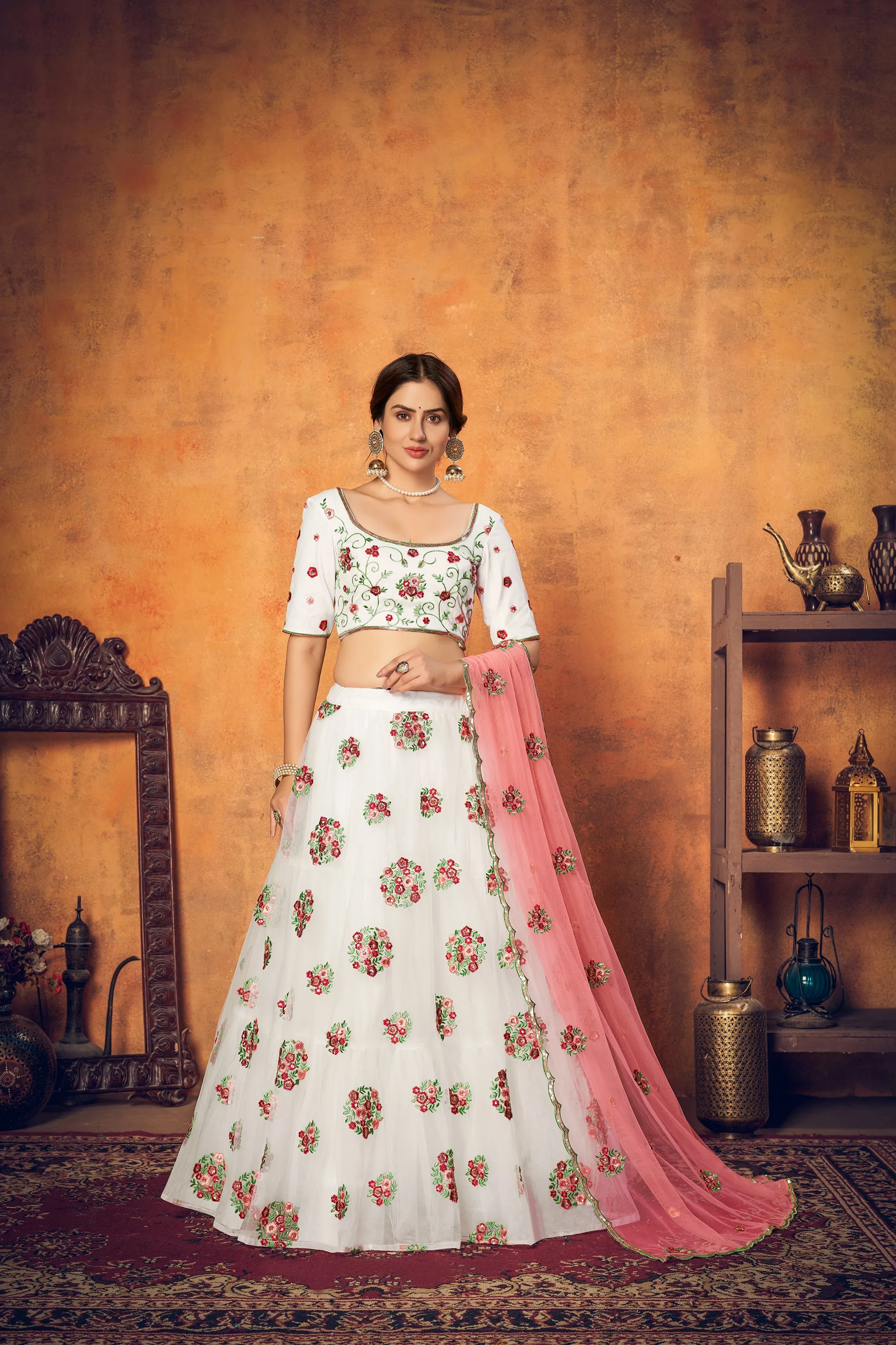 White Festive Wear Thread With Floral Sequence Embroidered Net Lehenga Choli